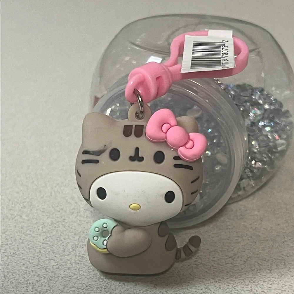Sanrio Brown Cat Keychain with Pink Bow